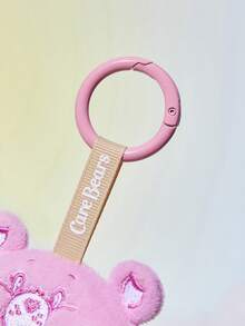 SHEIN X Care Bears 1个可爱粉色小熊甜甜圈吊坠，精致刺绣，毛绒钥匙扣，可挂在包包和钥匙链上。 - 粉色 - 查看 7