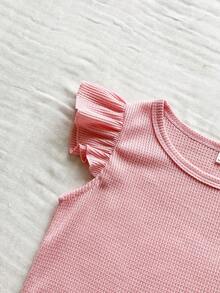 SHEIN Vintaside Kids 这款粉色华夫格针织短袖上衣，搭配牛仔裤，是春夏少女时尚又充满活力的两件套。精致的花朵刺绣增添了一丝甜美，引人注目。宽松的版型和适中的厚度，适合外出、度假、聚会以及休闲舒适的日常穿着。 - 粉色 - 查看 6