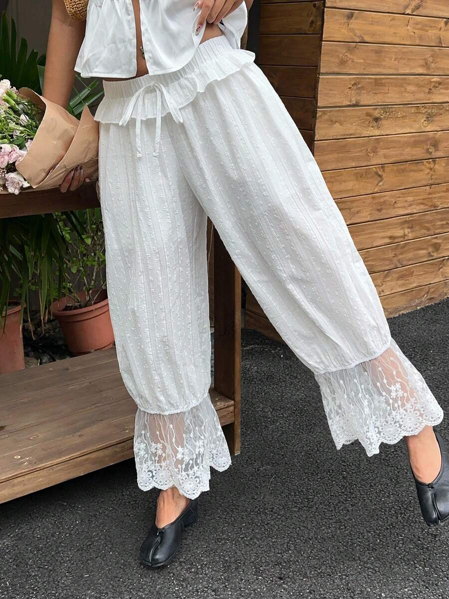 Sunnyshic Women's Casual Vacation Style Patchwork Embroidered Mesh Ruffle Hem Flare Pants - White - View 1