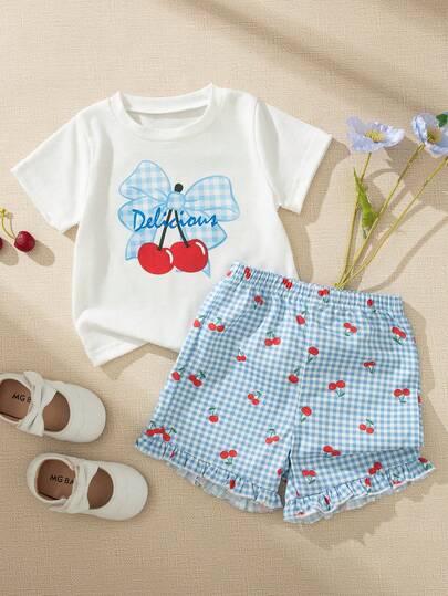 Souflis Souflis 法式风格 0-3 岁女婴白色圆领短袖T恤，饰以蓝色樱桃格纹图案，搭配蓝白格纹短裤，时尚休闲，百搭，适合外出、玩耍、上学等各种场合。
