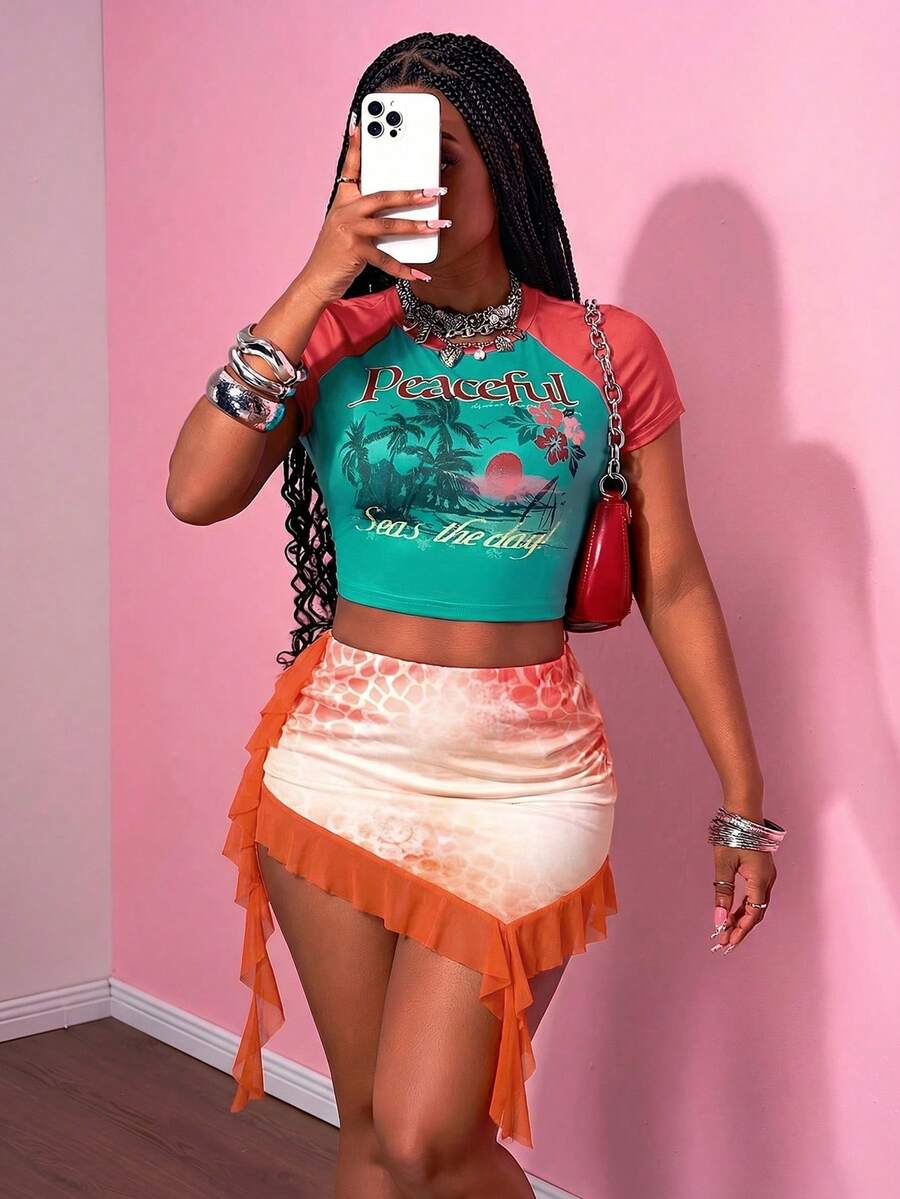 Slaydiva Bộ đồ hai mảnh nữ mùa hè 2025 mới, phong cách thường ngày, đường phố, retro, thích hợp đi hẹn hò, dự lễ hội âm nhạc, cổ tròn, tay ngắn, phối màu đỏ và xanh lá cây, in hình cây xanh, kèm chân váy xòe xếp ly không đều, dáng suông. - trái cam - Xem 1