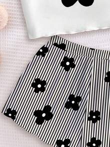 SHEIN Bộ đồ ngủ 2 món phong cách retro Y2K cho bé gái, gồm áo hai dây và quần short in họa tiết chấm bi và hoa, ấm áp cho mùa xuân và mùa hè. - Nhiều màu - Xem 5