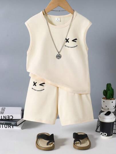 SHEIN Genkimix Kids 2pcs/Set Kids' Cute Graphic Print Sleeveless Tee And Shorts Sports Outfit, Black Base With Funny Face Design, Suitable For Summer Sports Or Casual Wear