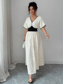 Modelyn Đầm midi xòe thanh lịch dành cho nữ, chất liệu jacquard đen trắng, phối eo tương phản, thích hợp cho mùa hè. - Đen và trắng - Xem 7