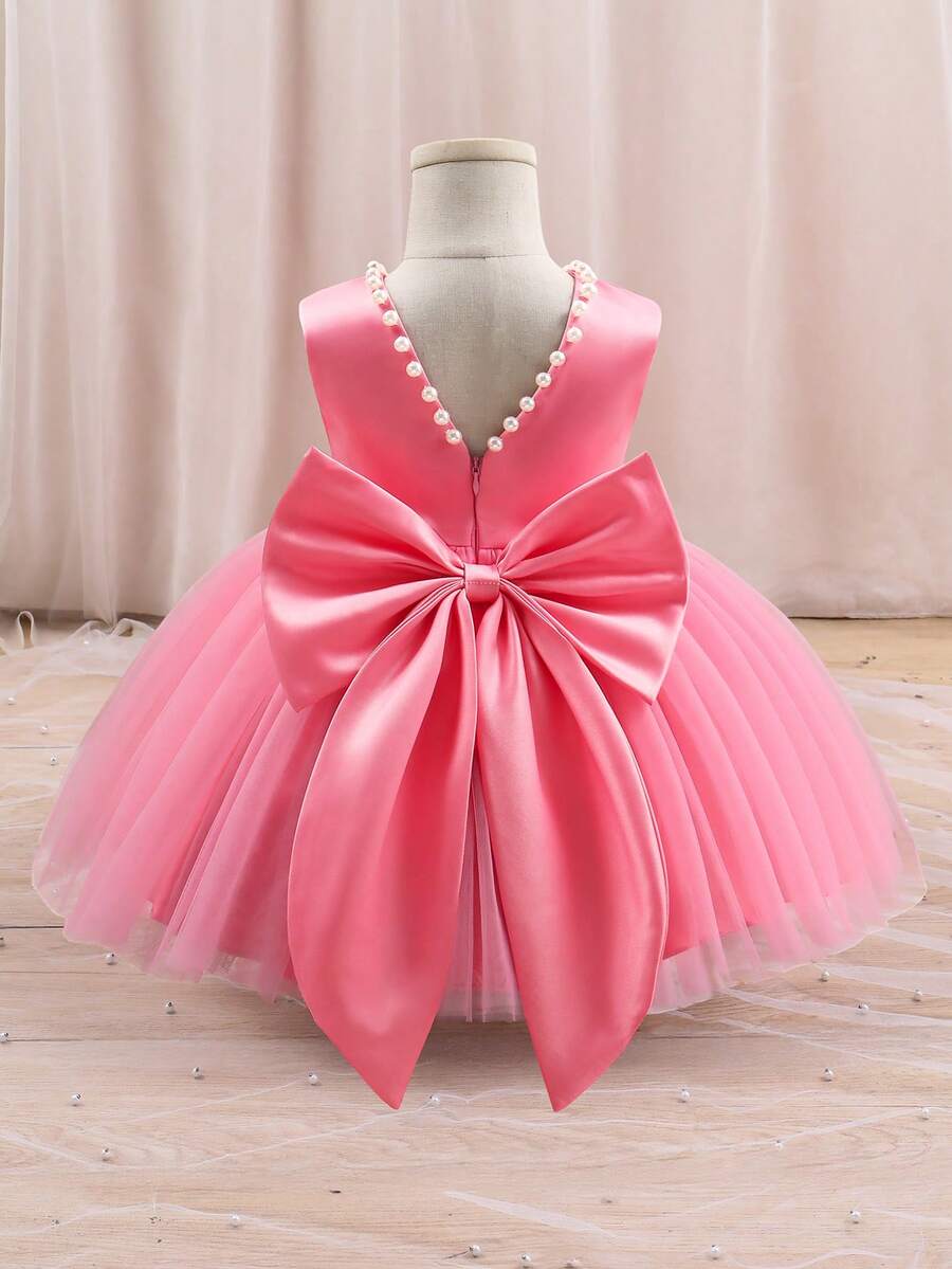 SHEIN Glamorique Kids 圣诞公主女童礼服,薄纱蓬蓬裙,适合花童、婚礼、派对,粉色;白色串珠V领露背大蝴蝶结公主裙 - 粉色 - 查看 1