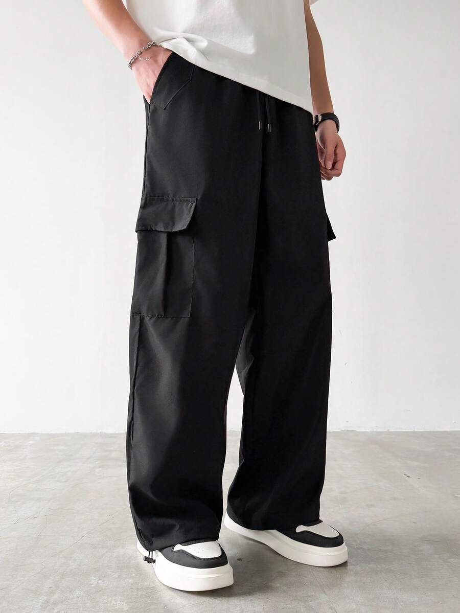 PAVTROS Men's Casual Solid Color Multi-Pocket Loose Straight Leg Cargo Pants - Black - View 1