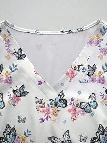PopScrub Bộ đồ 2 món nữ gồm áo cổ chữ V tay ngắn màu trắng in hình bướm và hoa, có túi và thiết kế tai thỏ, xẻ tà, và quần ống đứng, thích hợp làm đồng phục y tá mùa xuân/hè, trang phục thường ngày, bộ đồng phục. - Nhiều màu - Xem 6