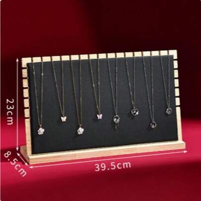 A Jewelry Display Stand With A Pendant And Necklace Storage Compartment. It Is A Display Item Suitable For The Back-To-School Season, Featuring Fashionable And Luxurious High-End Style. It Is Loved By Many People.