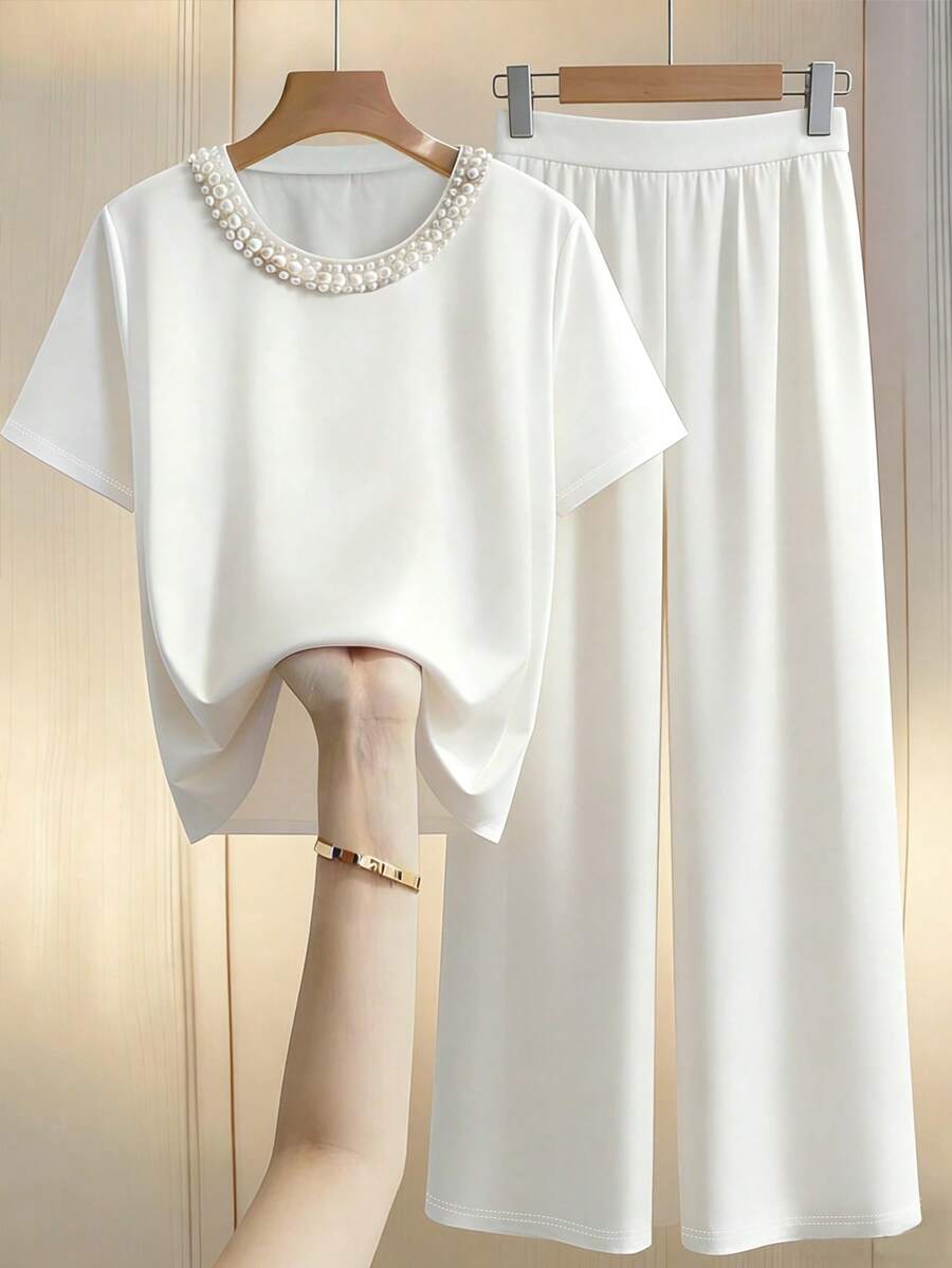 GlowEve CURVE Conjunto casual de 2 piezas con decoración de perlas y cuello redondo para mujeres de talla grande, nueva colección primavera/verano - Beis - Ver 1