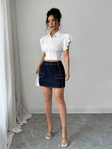 Elenzga Minifalda vaquera elegante y minimalista de corte evasé que estiliza la figura de la mujer - Azul lavado oscuro - Ver 9