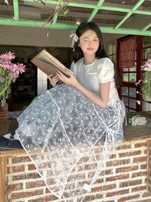 Đầm dài nữ kiểu dáng thanh lịch, dây mảnh, ren, xếp lớp, thắt nơ. - trắng - Xem 10