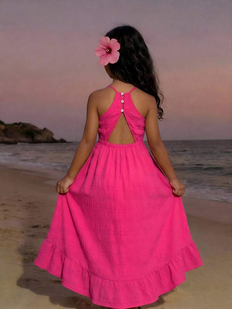 Đầm cổ yếm cho bé gái tuổi teen toát lên vẻ ngọt ngào của mùa hè! Chất liệu vải màu đỏ hồng tươi tắn, bắt mắt, mang đến nét tươi tắn của mùa xuân. Thiết kế cổ yếm và hở lưng thời trang. Chân váy xếp tầng nhiều lớp năng động và duyên dáng. Đi kèm với đầm còn có một chiếc túi đeo chéo nhỏ xinh, vừa tiện dụng vừa đáng yêu. Dù là đi chơi hay mặc hàng ngày, đầm đều toát lên vẻ tươi tắn rạng rỡ. - Màu Hồng Tươi - Xem 1