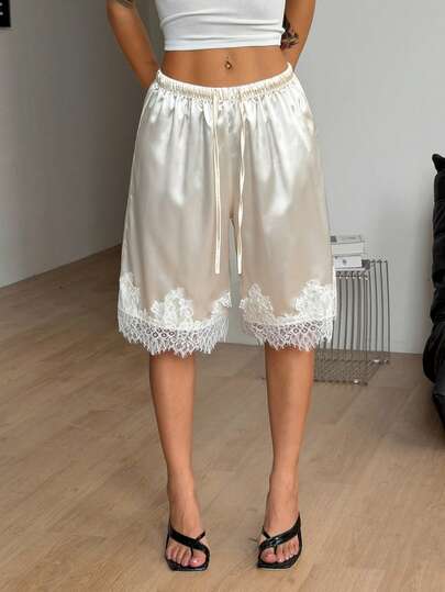 Coolane 女士纯色弹力腰带蕾丝边宽松短裤，缎面蕾丝边短裤，夏季服装，女士度假服装，春夏优雅休闲装扮，春夏奶油色荷叶边短裤，白色蕾丝短裤，灯笼裤荷叶边短裤