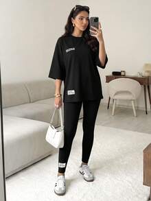 Solavon 2 件套女士夏季字母印花超大 T 恤和裤子休闲装 2 件套 - 黑色 - 查看 1