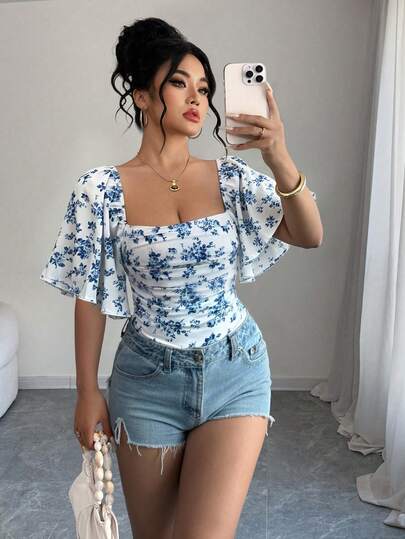 Elenzga Camiseta casual de cuello cuadrado con estampado total para mujer de talla grande