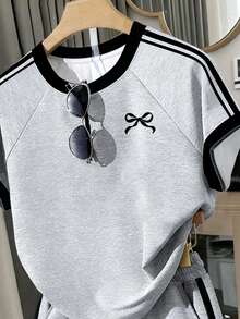 Bộ đồ 2 mảnh cho bé gái tuổi teen - Áo thun tay raglan dáng rộng màu xám và đen phối nơ + Quần short có túi dây rút, trang phục thể thao thường ngày, thiết kế mùa hè, đa năng, cơ bản, ngoài trời, áo thun cổ tròn tay ngắn mềm mại, phù hợp cho mặc hàng ngày, kỳ nghỉ, lễ hội, phong cách mùa xuân và mùa hè. - Nhiều màu - Xem 3