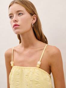 Nöista Textured Two Pieces Set In Soft Pastel Yellow, Featuring A Straight-Neck Camisole With Adjustable Straps And Matching High-Waist Wide-Leg Pants. Wear Together For A Coordinated Outfit Or Mix And Match, Spring, Summer, Vacation, Holiday, Outfit. - Yellow - View 5