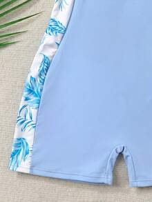 Bộ đồ thể thao cho bé gái tuổi teen, gồm áo chống nắng tay raglan in họa tiết lá xanh, có khóa kéo và quần short. - Màu xanh nhạt - Xem 5
