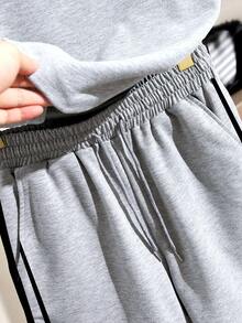 Bộ đồ 2 mảnh cho bé gái tuổi teen - Áo thun tay raglan dáng rộng màu xám và đen phối nơ + Quần short có túi dây rút, trang phục thể thao thường ngày, thiết kế mùa hè, đa năng, cơ bản, ngoài trời, áo thun cổ tròn tay ngắn mềm mại, phù hợp cho mặc hàng ngày, kỳ nghỉ, lễ hội, phong cách mùa xuân và mùa hè. - Nhiều màu - Xem 6