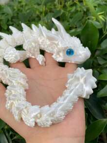 MINKOJA 一款3D打印的30厘米仿真双眼双角小龙模型玩具,可作为减压玩具、感官玩具、软萌玩具或儿童玩具,是课后、圣诞节、生日和节假日的绝佳礼物。(眼睛颜色随机) - 彩色 - 查看 21