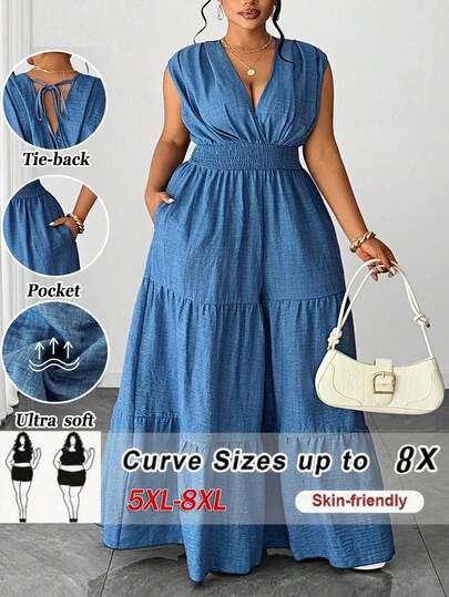 SHEIN CURVE+ Bộ jumpsuit thời trang dành cho nữ cỡ lớn, chất liệu giả denim, kiểu dáng thanh lịch, xếp ly, thắt chéo eo có dây rút, nơ phía sau, viền bèo nhún nhiều lớp, thiết kế đa năng phù hợp cho tiệc tùng, hẹn hò, kỳ nghỉ, đi biển, lễ hội âm nhạc.