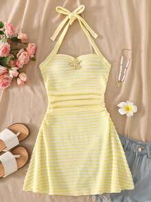 SHEIN Đầm cổ yếm màu vàng kẻ sọc dành cho bé gái tuổi teen, thiết kế hở vai, trang trí sao biển kim loại màu vàng, chất vải mềm mại phù hợp cho mùa hè, họa tiết tinh tế phù hợp cho các dịp hàng ngày và giao lưu nhẹ nhàng, thanh lịch và thoải mái, dễ phối đồ và bảo quản, tạo nên vẻ ngoài ngọt ngào và dịu dàng cho bé gái. - Màu vàng - Xem 3