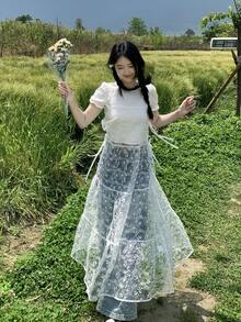 Đầm dài nữ kiểu dáng thanh lịch, dây mảnh, ren, xếp lớp, thắt nơ. - trắng - Xem 5