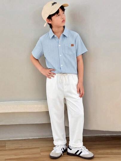 Bộ 2 món đồ cho bé trai tuổi teen, kiểu dáng rộng rãi, màu trơn, áo polo cổ bẻ tay ngắn và quần.