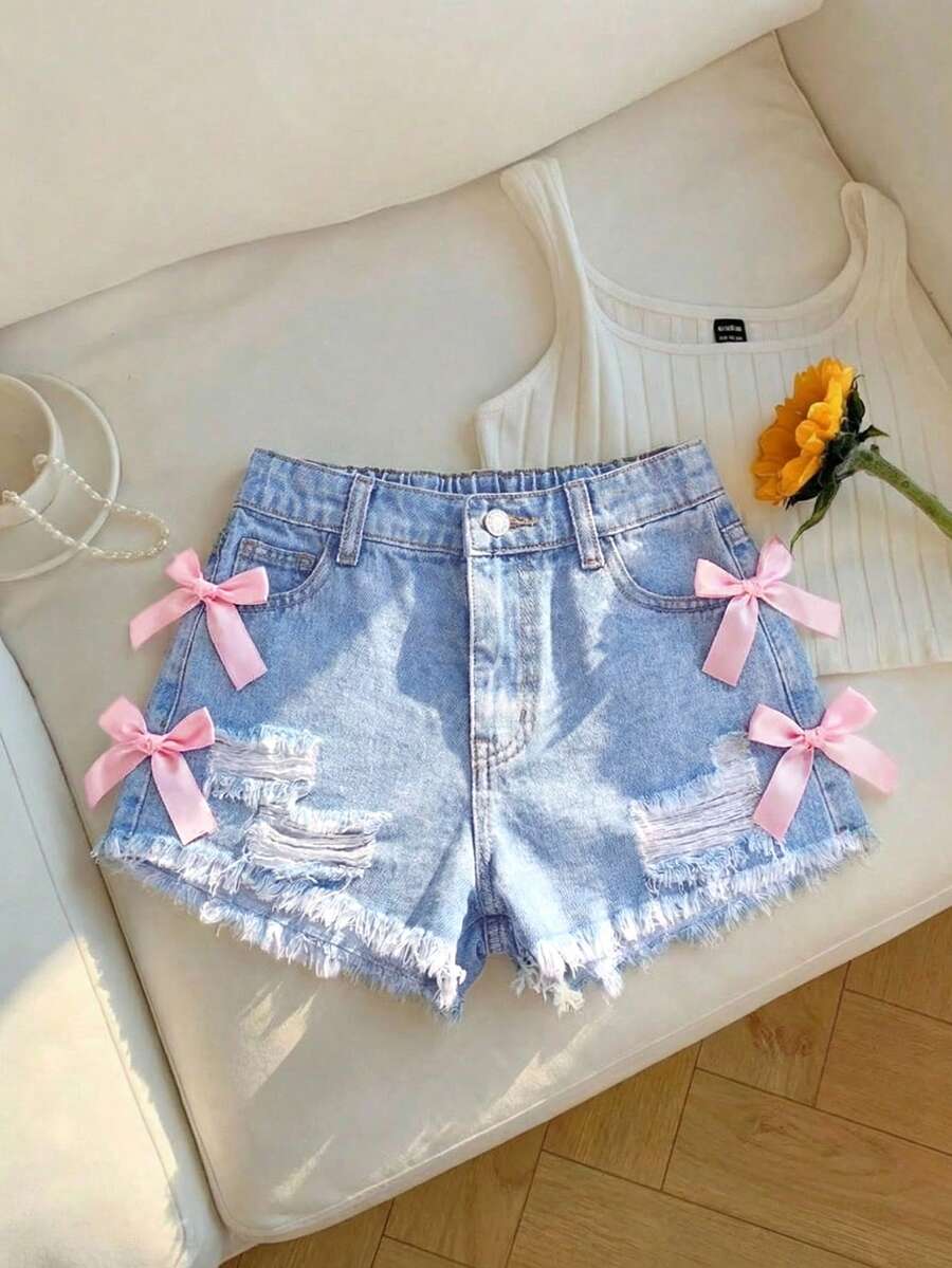 SHEIN Quần short denim nữ thiếu niên Y2K mùa xuân hè, màu xanh nhạt, phong cách casual đa năng, cạp thấp, rách gấu, gấu raw, phong cách boho cho đi biển, nghỉ dưỡng, concert, lễ hội và rave mùa hè - Màu xanh lam - Xem 1
