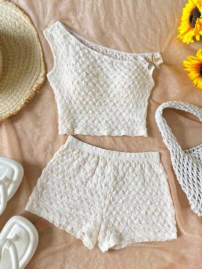 SHEIN Bộ áo hai dây và quần short thoải mái, vừa vặn cho bé gái tuổi teen, đa năng để mặc hàng ngày.