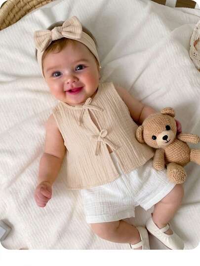 SHEIN Newborn Baby Girl Casual Cute Versatile Apricot Bow Sleeveless Tank Top Beige Baby Outfit Baby Summer Clothing Baby Vest Baby Top Baby Short Shirt Baby Girl Clothes Neutral Baby Outfits Newborn Baby Summer Clothes Baby Formal Outfit Baby Beige Outfits Neutral Baby Clothes Ootd For Baby Girl 0 To 12months Photoshoot Outfit For Baby Baby Summer Outfits Infant Summer Outfit Baby Girl Set Baby Photo Bamboo Baby Clothes