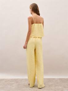 Nöista Textured Two Pieces Set In Soft Pastel Yellow, Featuring A Straight-Neck Camisole With Adjustable Straps And Matching High-Waist Wide-Leg Pants. Wear Together For A Coordinated Outfit Or Mix And Match, Spring, Summer, Vacation, Holiday, Outfit. - Yellow - View 2