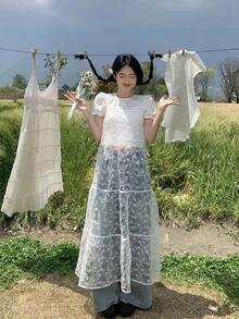 Đầm dài nữ kiểu dáng thanh lịch, dây mảnh, ren, xếp lớp, thắt nơ. - trắng - Xem 1