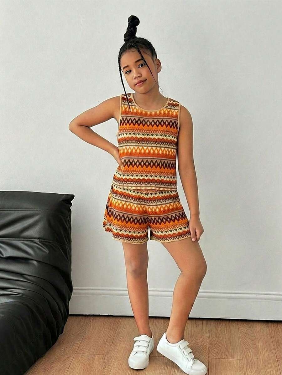 Bộ đồ 2 mảnh dành cho bé gái tuổi teen, kiểu dáng thường ngày, cổ tròn, chất liệu vải có họa tiết, thắt nơ sau lưng, gồm áo tank top và quần short. - Nhiều màu - Xem 1
