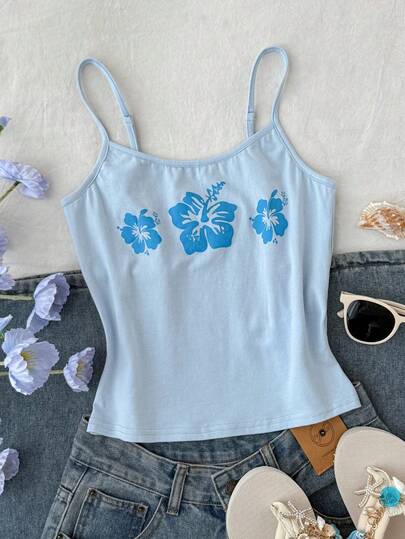 少女休闲轻薄蓝色针织露脐吊带背心，饰有芙蓉花印花，适合春夏穿着，百搭时尚，日常百搭。