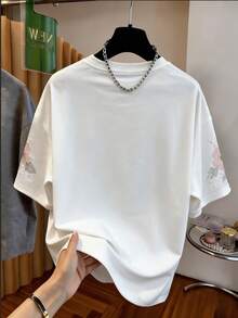 GlowEve 女士圆领蝴蝶花卉刺绣仿珍珠装饰短袖上衣，适合休闲、通勤、约会、派对、居家、外出、下午茶、海滩度假、旅行及各种场合。 - 白色 - 查看 2