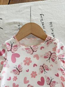 SHEIN LMoss Kids Conjunto de pijama suave de 2 piezas para recién nacida, con cuello redondo, manga corta y estampado de dibujos animados con volantes - Multicolor - Ver 4