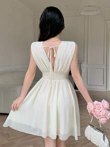 YkhahaYkhahaCelisse Vestido corto de mujer con escote en V, de gasa con parches, con cintura ceñida en forma de X, elegante para vacaciones, primavera/veranoYkhahaYkhaha - Albaricoque - Ver 5