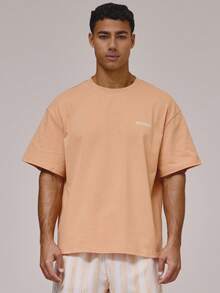 Camiseta de manga corta oversize con gran estampado gráfico con eslogan "MUSERO HOTEL" en la espalda, esencial para vacaciones de primavera y verano - Naranja - Ver 4