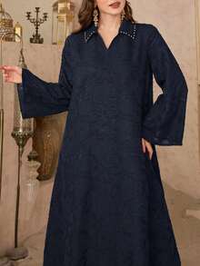 Modelyn Áo sơ mi dài tay dáng rộng, thanh lịch, sang trọng, cổ áo bằng vải jacquard có họa tiết, đính đá lấp lánh. - Xanh đậm - Xem 4