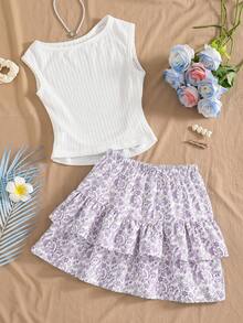 SHEIN Sparklyn Bộ đồ hai mảnh mới dành cho nữ tuổi teen này gồm áo vest cổ tròn màu xanh dương co giãn, thoải mái, mang phong cách nghỉ dưỡng, kết hợp với chân váy hai tầng cùng màu. Phần eo và gấu áo vest được xếp ly tạo nên vẻ ngoài thanh lịch. Bộ đồ chất lượng cao này hoàn hảo cho trang phục hàng ngày, bao gồm cả các kỳ nghỉ, du lịch và tiệc tùng, lý tưởng cho mùa xuân và mùa hè. - Nhiều màu - Xem 2