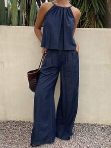 Bộ đồ nữ gồm áo hai dây rộng rãi và quần jeans ống đứng, thích hợp cho mùa xuân và mùa hè. - Màu xanh lam - Xem 4