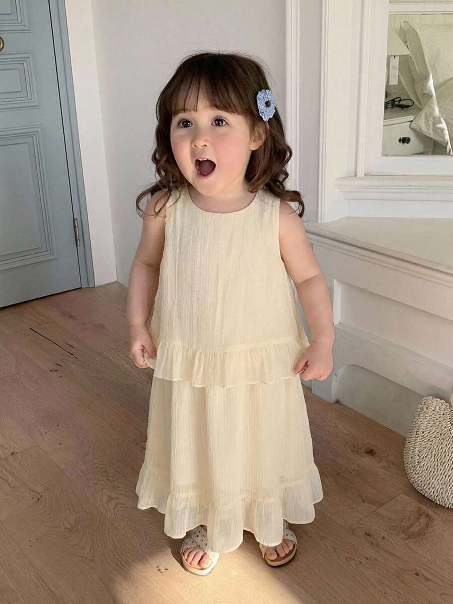 Bộ đồ 2 món kiểu Hàn Quốc cho bé gái: Áo không tay xếp bèo và quần ống rộng. - Màu be - Xem 1