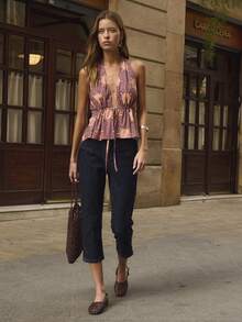 Nöista Sunflower Print Halter Top Is Elegant And Cute, Featuring A Large Print, Drawstring Waist, And Ruffled Hem In A Bohemian Style. The Soft Material Is Perfect For Summer And The Beach, Making It A Striking Piece For A Casual Summer Vacation. - Orange - View 3