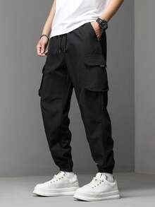 Manfinity Hypemode Pantalones cargo de moda casual para hombre con cintura con cordón, bolsillo con solapa y puños, adecuados para el uso diario - Negro - Ver 3