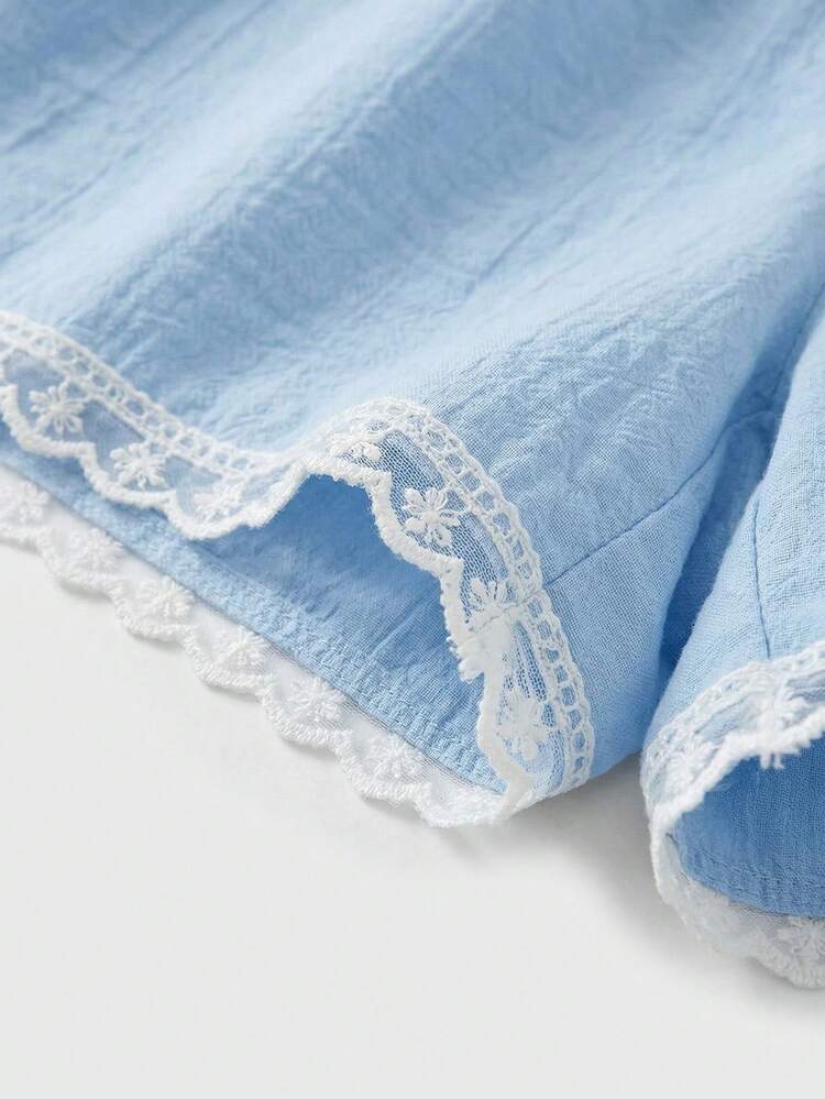 Blue High Waisted Loose Fit Short With White Trim Around Hem Spring Summer French Style Parisian Style Going Out Holiday Outfit Resort Outfit For Women Shorts Women Blue Shorts Women Skirt Style Shorts Shorts With Lace