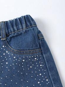 Bộ đồ denim cho bé gái, nhẹ nhàng mùa hè, phong cách đường phố dễ thương, áo hai dây denim vạt lệch có dây điều chỉnh + quần denim ống rộng cạp chun dễ phối đồ, chất liệu denim cotton mềm mại, phù hợp cho mặc hàng ngày, dự tiệc, đi học, sản phẩm mới năm 2026. - Rửa trung bình - Xem 6