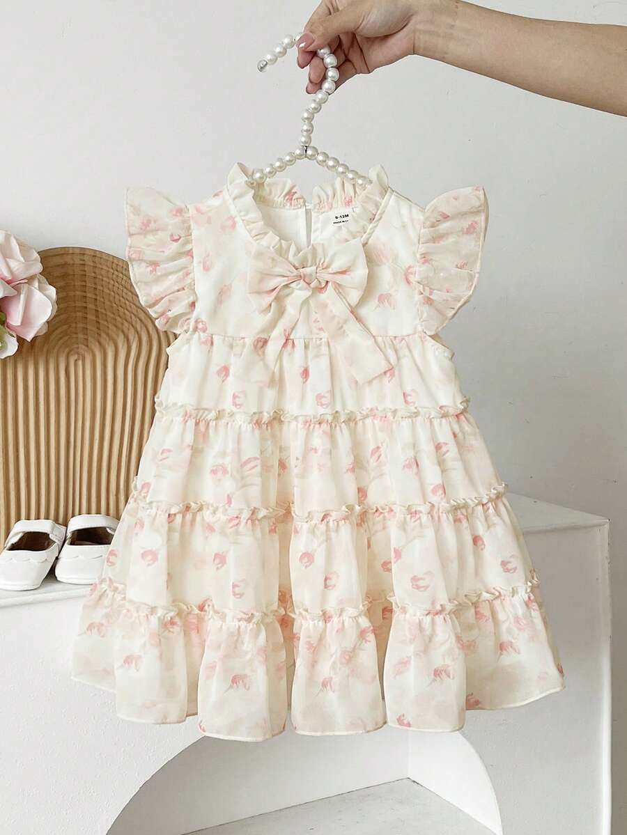 SHEIN Baby Girls' Fashionable Casual Floral Pattern Bow Decor Cake Dress, Suitable For Spring, Summer, Autumn, Home, Vacation, Holiday, Party, Daily Wear - White - View 1