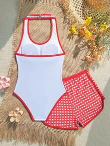 SHEIN Bộ đồ bơi liền thân cổ yếm in hình nơ dâu tây ngọt ngào dành cho bé gái tuổi teen, kèm quần bơi kẻ caro, thích hợp đi biển/nghỉ mát. - Nhiều màu - Xem 2
