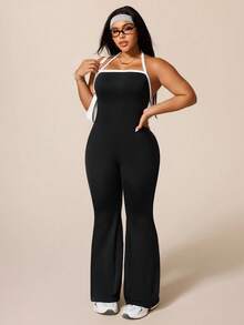 Rhythm Era Plus Size Women's Sleeveless Backless Jumpsuit, Seamless Sports Yoga Casual Flare Pants - Black and White - View 1